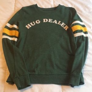 A warm worn once forest green sweater